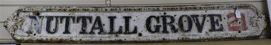 A cast iron street sign for Nuttal Grove 21 length 154cm